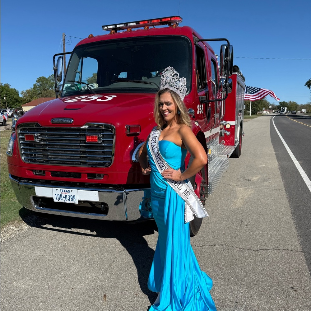 Elegant Blue Gown with Crown